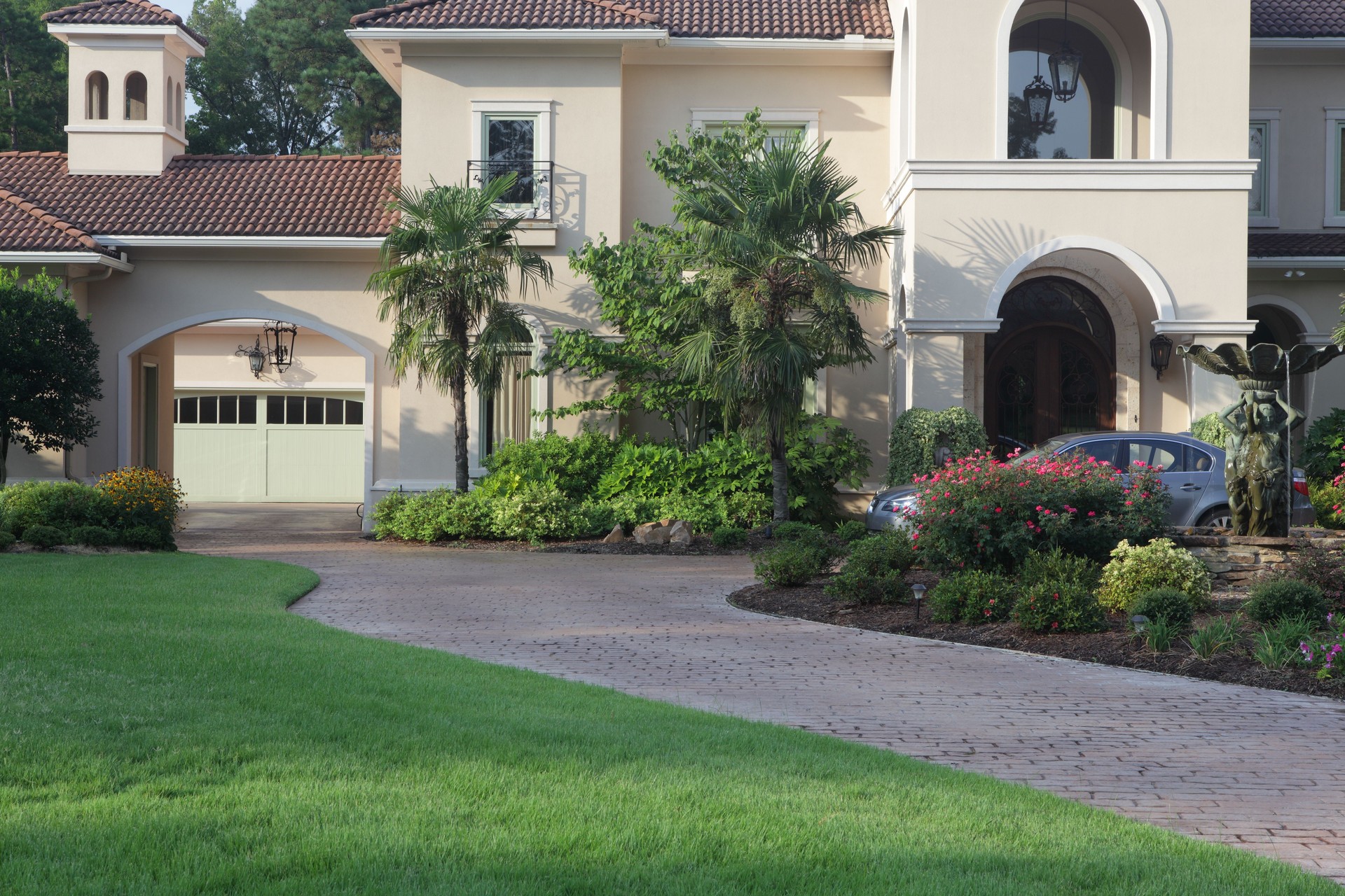 Front entrance and driveway of a luxury home